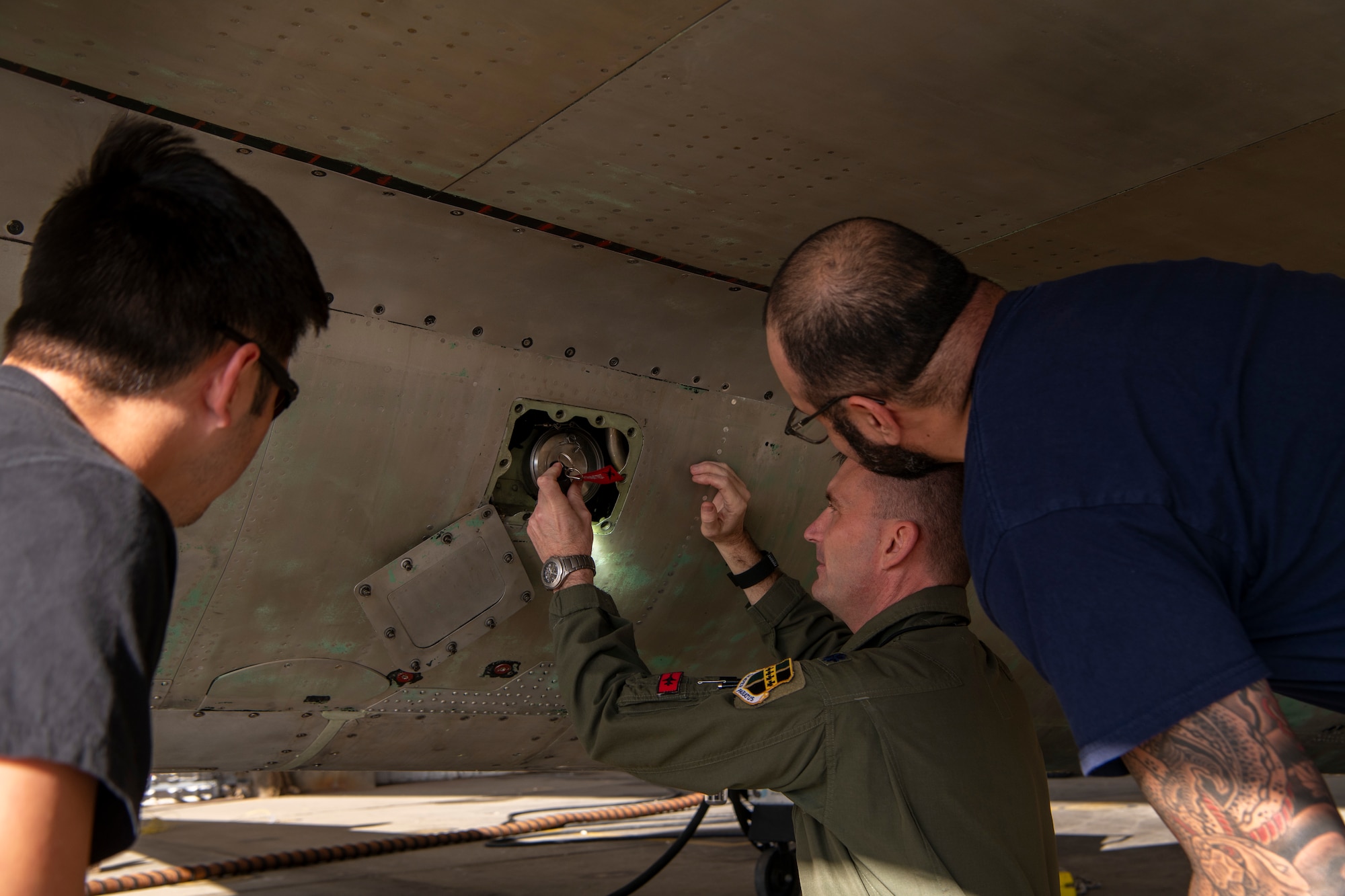 U.S. Air Force Lt. Col. Joshua, 1st Reconnaissance Squadron student flight commander, inspects how clean the insides of TU-2S Dragon Lady 1078 after almost three years of maintenance to restore the two-seater U-2 at Beale Air Force Base, California, Jan. 25, 2024.