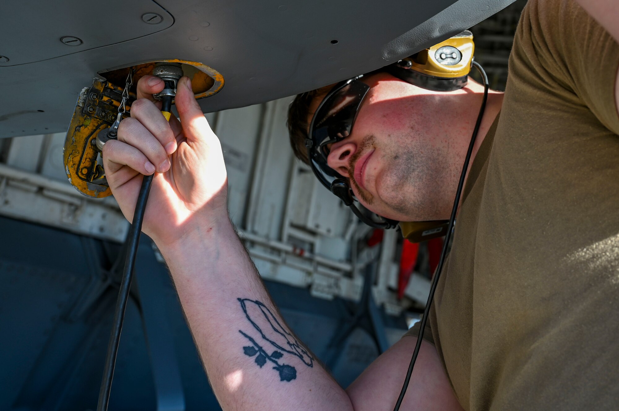 Airman plus in headset to jet