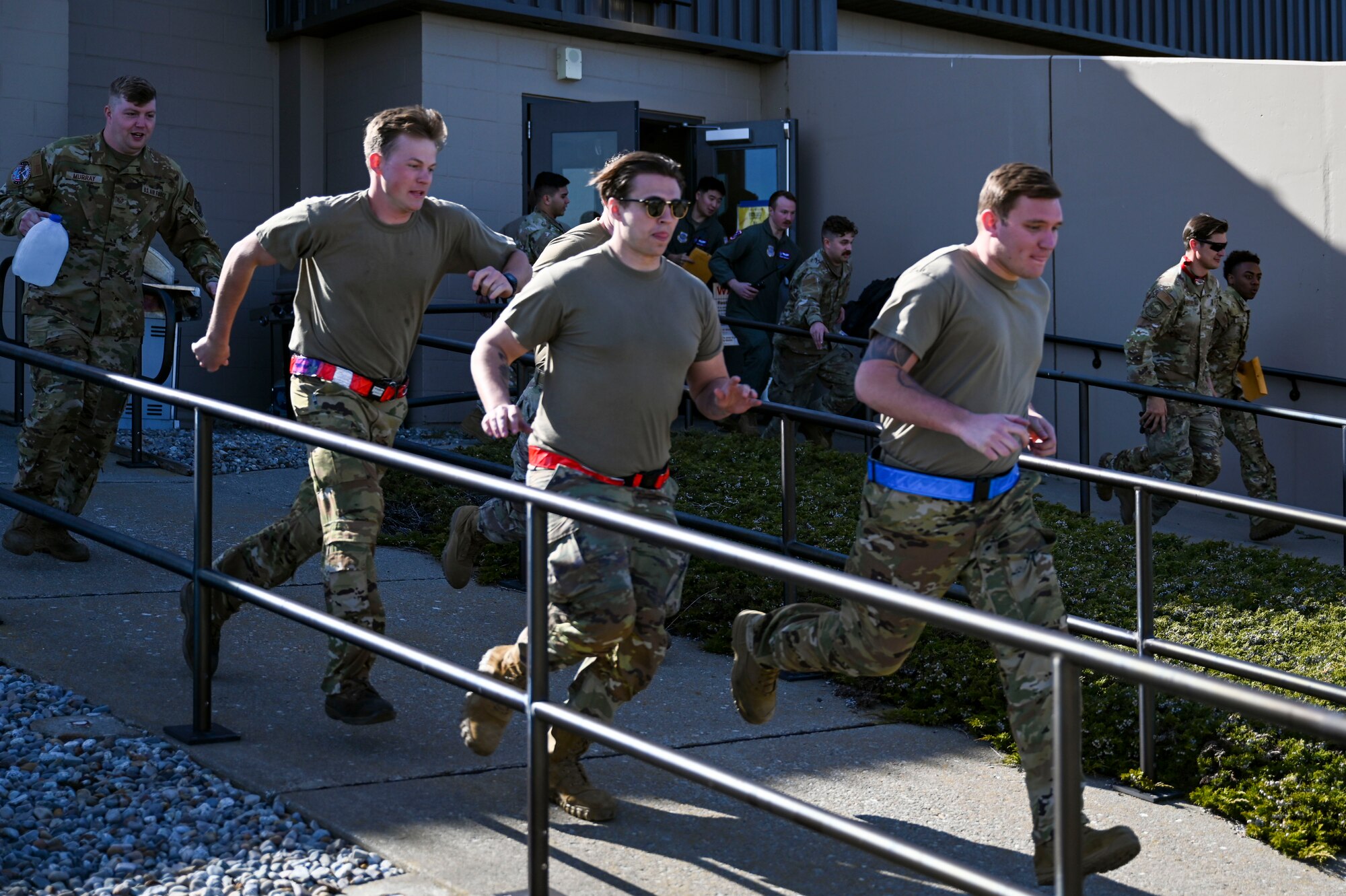 Airmen run to vehicles