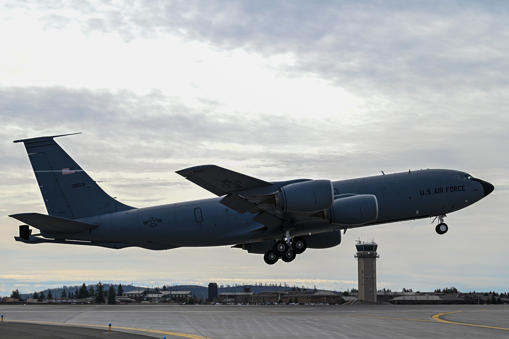 KC-135 Stratotanker flies by watch tower