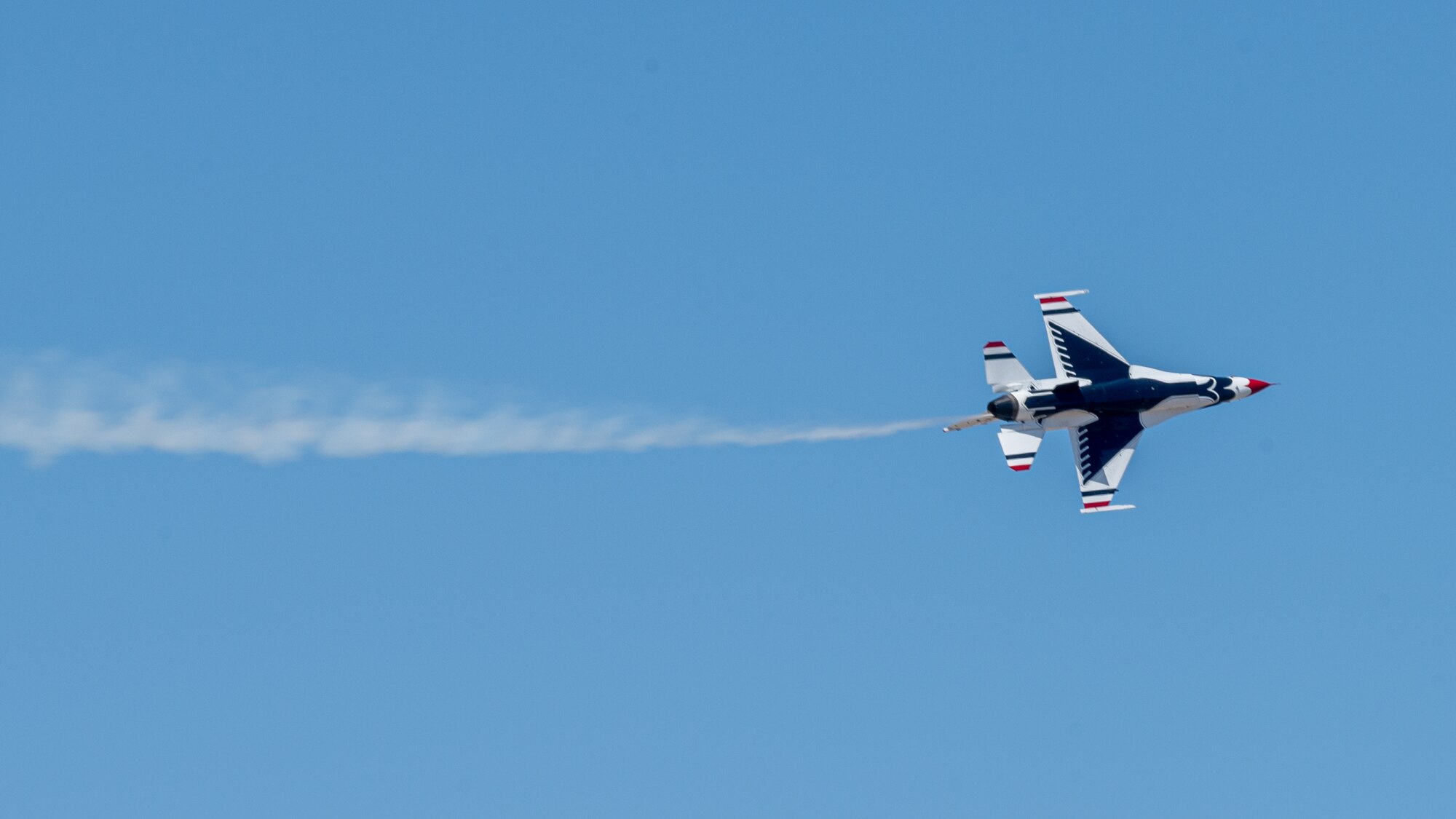 A U.S. Air Force F-16 Fighting Falcon, assigned to the U.S. Air Demonstration team, the "Thunderbirds," practice the day prior to the Luke Days 2024 airshow on March 22, 2024, at Luke Air Force Base, Arizona.