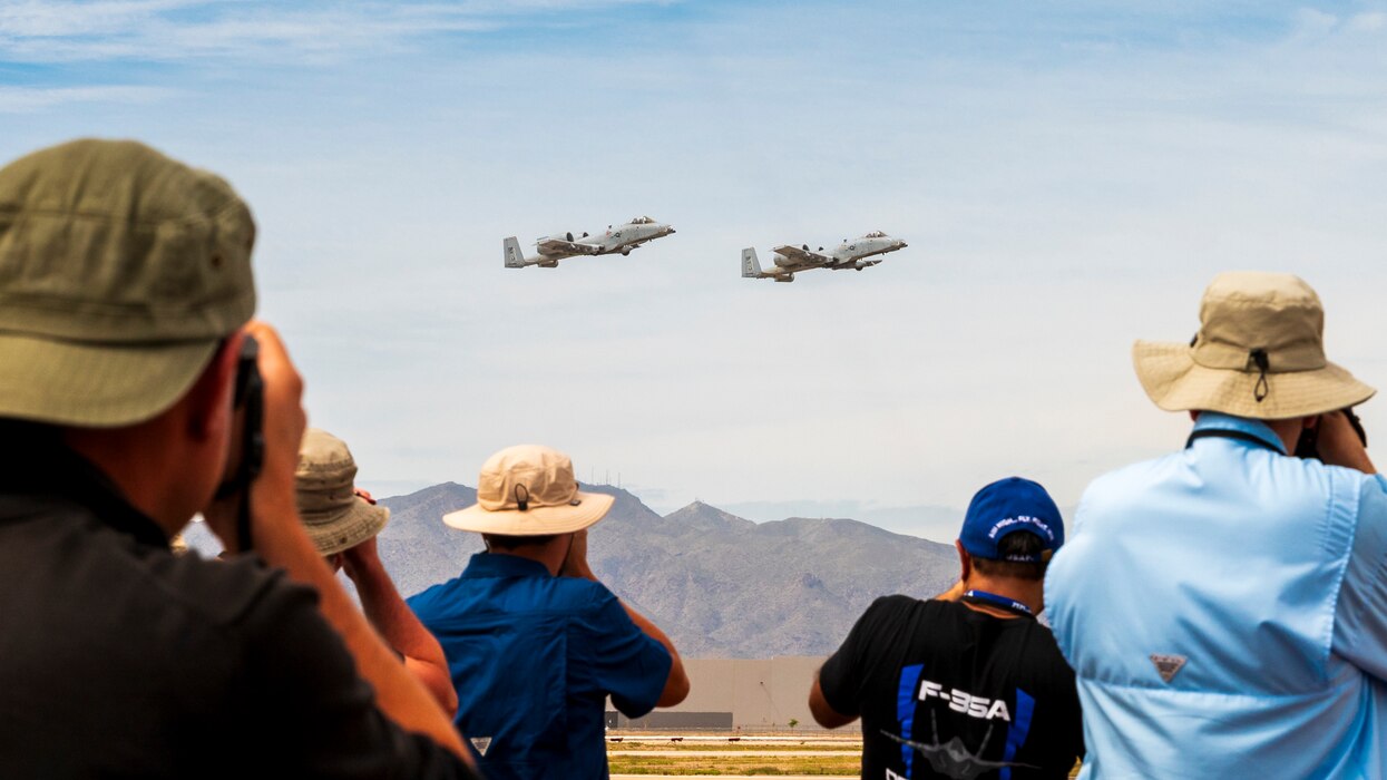 Two U.S. Air Force A-10 Thunderbolt IIs, assigned to the A-10 Demonstration Team, performs in a combat arms demonstration during Luke Days 2024, March 23, 2024 at Luke Air Force Base, Arizona.