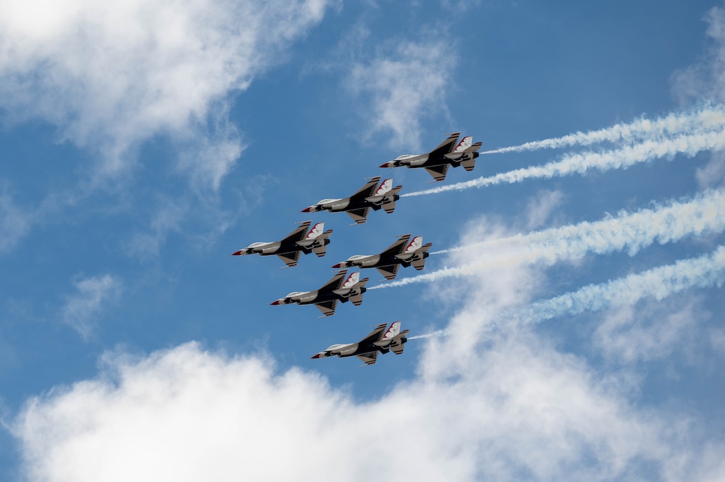 U.S. Air Force F-16 Fighting Falcons, assigned to the U.S. Air Force Demonstration team, the "Thunderbirds," execute a carefully choreographed demonstration during the Luke Days airshow on March 23, 2024, at Luke Air Force Base, Arizona.