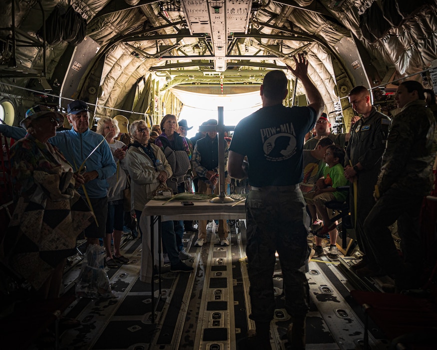 U.S. Air Force Capt. Adam Roe, 56th Fighter Wing chaplain, provides a Palm Sunday service in a C-130J Super Hercules aircraft assigned to the 317th Airlift Wing, Dyess Air Force Base, during the Luke Days airshow on March 24, 2024, at Luke Air Force Base, Arizona.