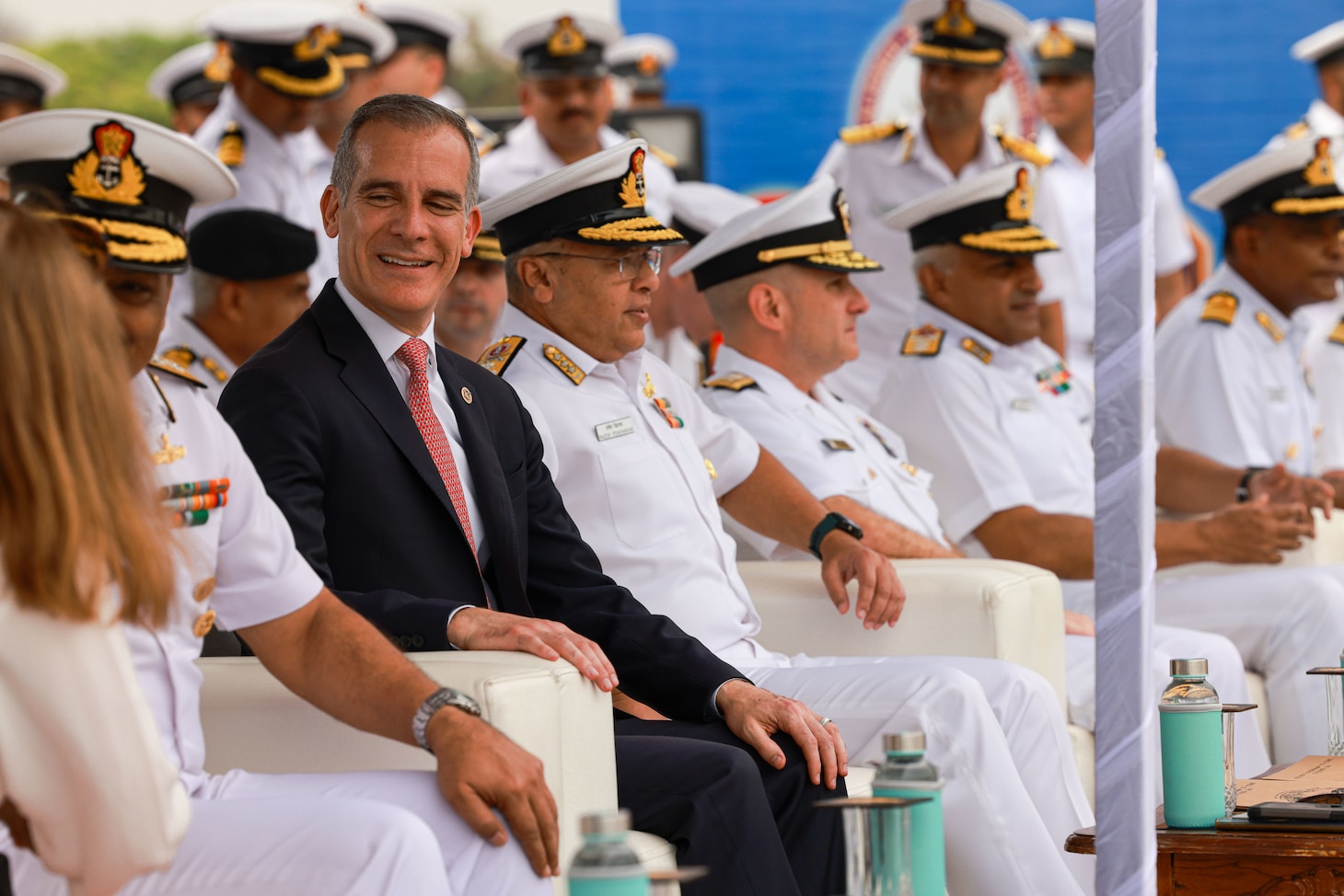 U.S. Ambassador to the Republic of India, Eric Garcetti, makes introduction with other distinguished visitors at the opening ceremony of Exercise Tiger TRIUMPH in Visakhapatnam, India, March 19, 2024. Tiger TRIUMPH, which stands for Tri-Services India U.S. Amphibious Exercise, is a U.S.-India exercise focused on humanitarian assistance and disaster relief readiness to improve bilateral compatibility and interoperability between U.S. and Indian Armed Forces and enhance bilateral, joint, and services readiness in the Indian Ocean region. (U.S. Marine Corps photo by Cpl. Aidan Hekker)