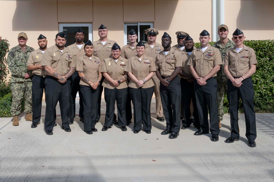 Sailors, assigned to the Public Works Department, Naval Support Activity Souda Bay, and NSA Souda Bay receive an Intermediate Leader Development Course Certificate of Completion from Cmdr. James Kotora, executive officer, NSA Souda Bay, and Chief Master-at-Arms Michael Deane on March 21, 2024.