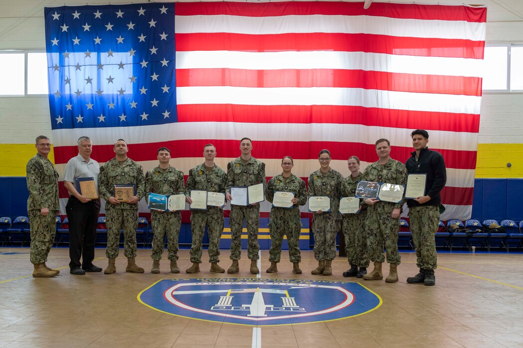 Sailors and personnel assigned to Naval Support Activity Souda Bay, Greece, receive awards and recognitions from Capt. Odin J. Klug, commanding officer, NSA Souda Bay, during an awards ceremony on March 20, 2024.