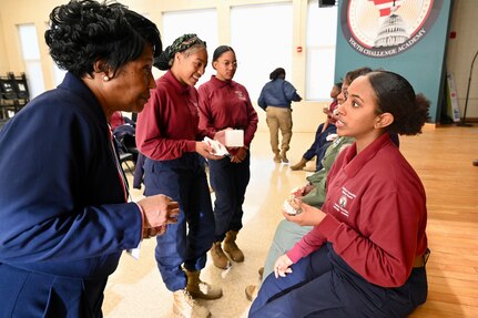 Chief Master Sgt. Tracy Winborne, senior enlisted leader, 201st Airlift Squadron, District of Columbia Air National Guard, and Johnnie Scott-Rice, chairperson, National Congress of Black Women, serve as guest speakers for the Capital Guardian Youth Challenge Academy’s monthly Cupcakes and Conversations, March 21, 2024.  Cupcakes and Conversations provides a space for one-on-one engagements with prominent civic leaders and professionals.