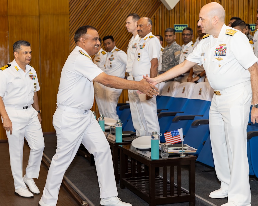 Rear Adm. Joaquin Martinez and Indian navy Rear Adm. Rajesh Dhankhar meet during a Tiger Triumph commander's brief in Visakhapatnam, India.