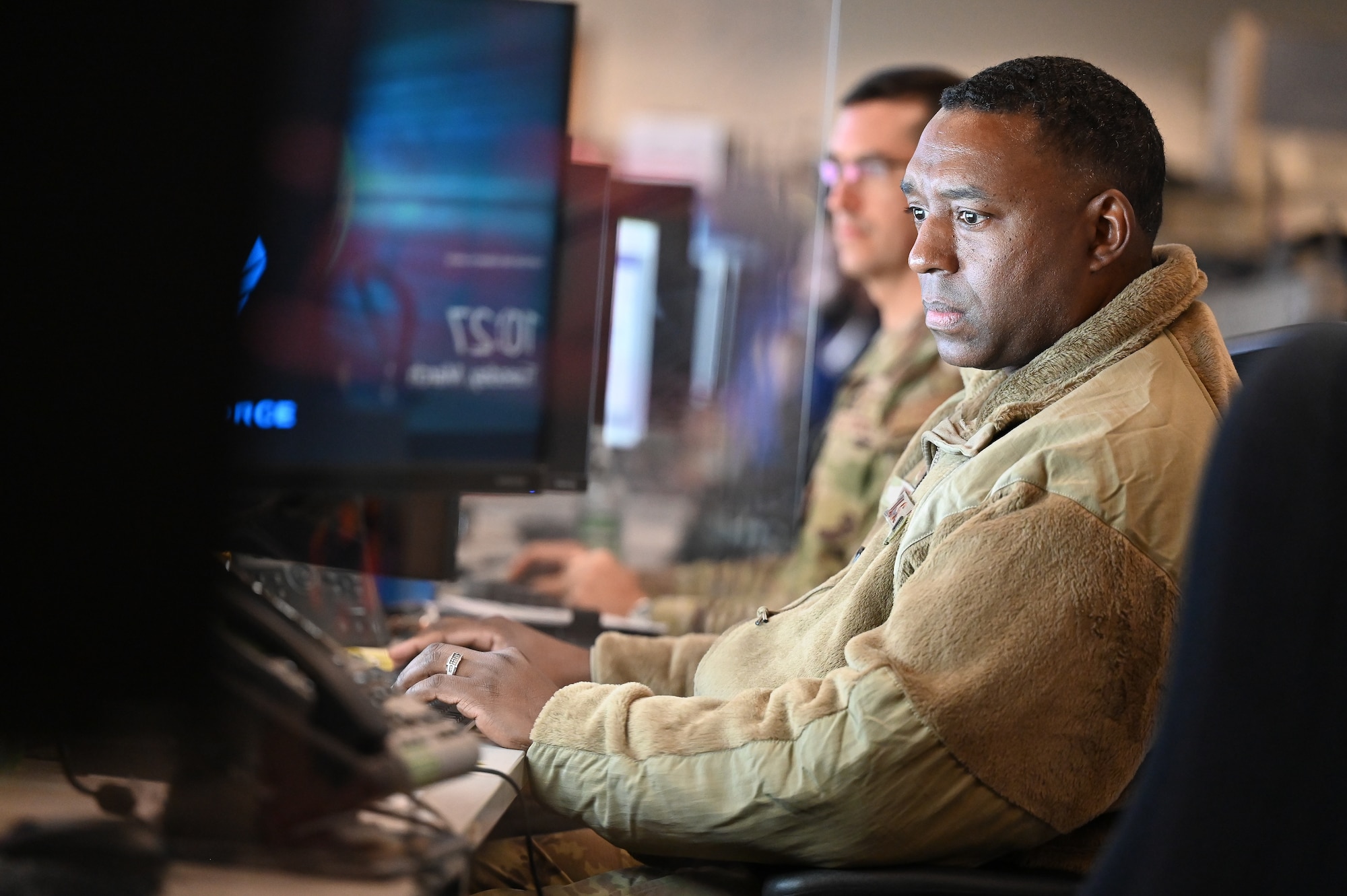 A photo of an Airman at a computer. 