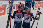 U.S. Army Sgt. Deedra Irwin, left, human resources specialist, Joint Force Headquarters, Vermont National Guard, celebrates completing the Women's 10 km Pursuit with her U.S. Biathlon teammate, Margie Freed, during the International Biathlon Union World Cup races at Soldier Hollow in Utah March 10, 2024. The last time the U.S. hosted World Cup races was in 2019.