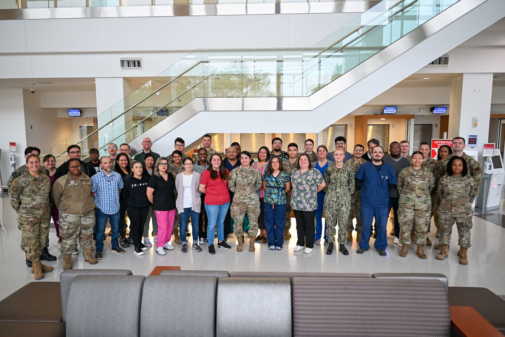 Pharmacy team poses for a group photo inside Wilford Hall Ambulatory Surgical Center