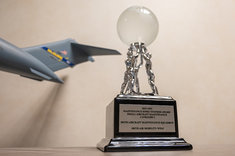 The 305th Aircraft Maintenance Squadron’s 2023 Maintenance Effectiveness Award is on display at Joint Base McGuire-Dix-Lakehurst, N.J., March 7, 2024. The squadron was awarded the award in the Small Aircraft Maintenance Unit category, recognizing them as one of the Air Force’s top-performing maintenance units. (U.S. Air Force photo by Senior Airman Simonne Barker)