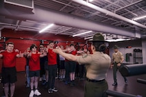 U.S. Marine Corps Staff Sgt. Katrina Jimenez, a senior drill instructor with Echo Company, 2nd Recruit Training Battalion, instruct poolees on close order drill during Recruiting Sub-Station Madison’s Drill Instructor Night at Milton High School, Milton WI, March 19, 2024. The purpose of Drill Instructor Night is to introduce poolees to incentive training, basic drill movements and give family and friends the opportunity to ask questions about recruit training and the Marine Corps. (U.S. Marine Corps photo by Cpl. Collette Hagen)