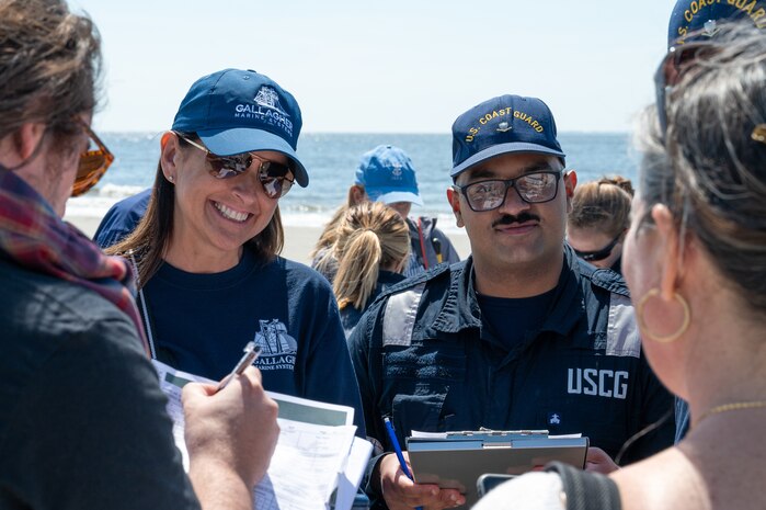 A photo of several people talking.