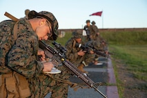 U.S. Marine Corps recruits with Alpha Company, 1st Recruit Training Battalion, mark their shot groupings during the table one course of fire at Marine Corps Base Camp Pendleton, California, March 19, 2024. Table one is designed to introduce recruits to the basic fundamentals of marksmanship and rifle safety. (U.S. Marine Corps photo by Cpl. Sarah M. Grawcock)