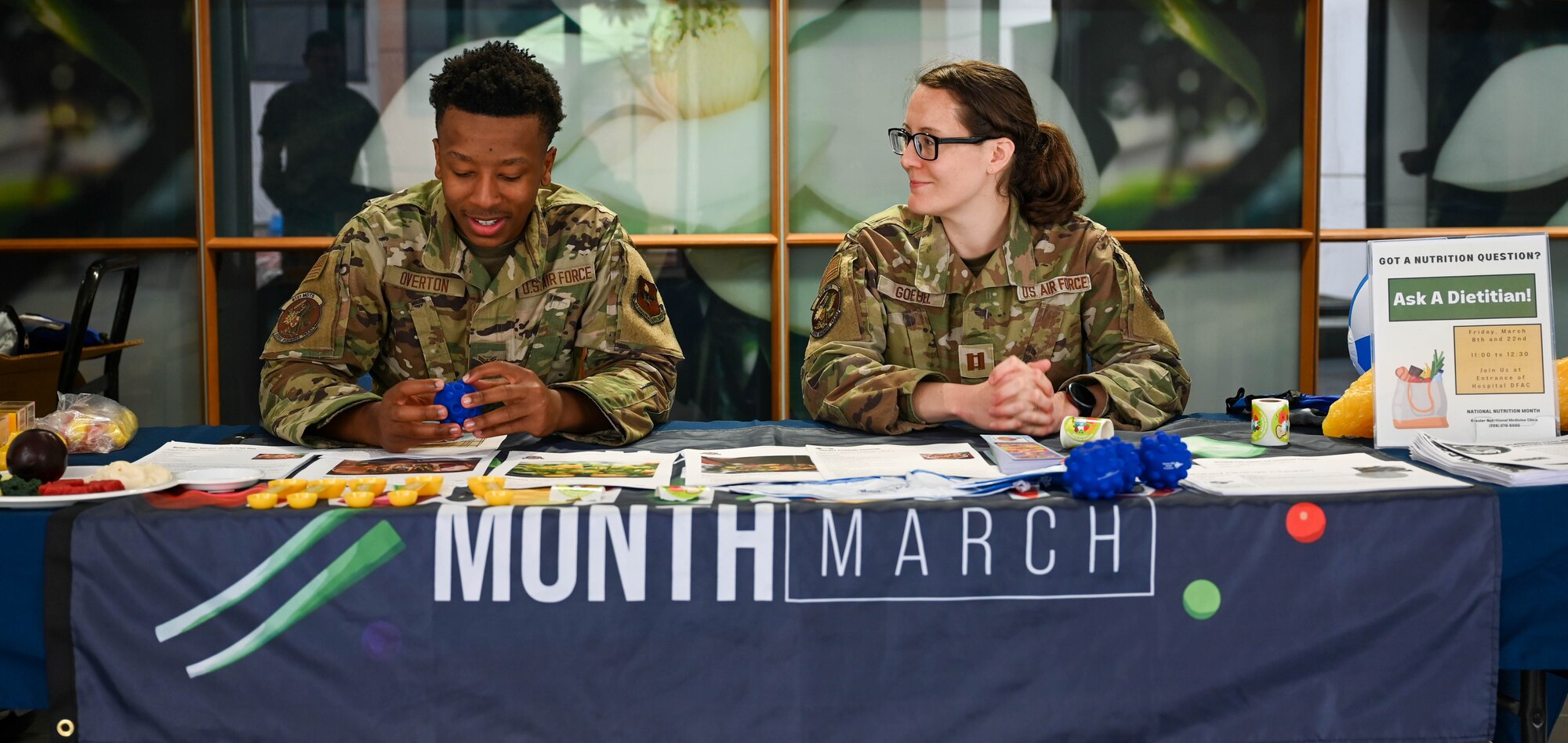 U.S. Air Force Capt. Rachelle Goebel, 81st Medical Group nutritional medicine chief, and Airman 1st Class Darren Overton, 81st MDG diet technician, hold an "Ask a Dietitian" panel for National Nutrition Month at Keesler Air Force Base, Mississippi, Mar. 22, 2024.