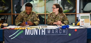 U.S. Air Force Capt. Rachelle Goebel, 81st Medical Group nutritional medicine chief, and Airman 1st Class Darren Overton, 81st MDG diet technician, hold an "Ask a Dietitian" panel for National Nutrition Month at Keesler Air Force Base, Mississippi, Mar. 22, 2024.