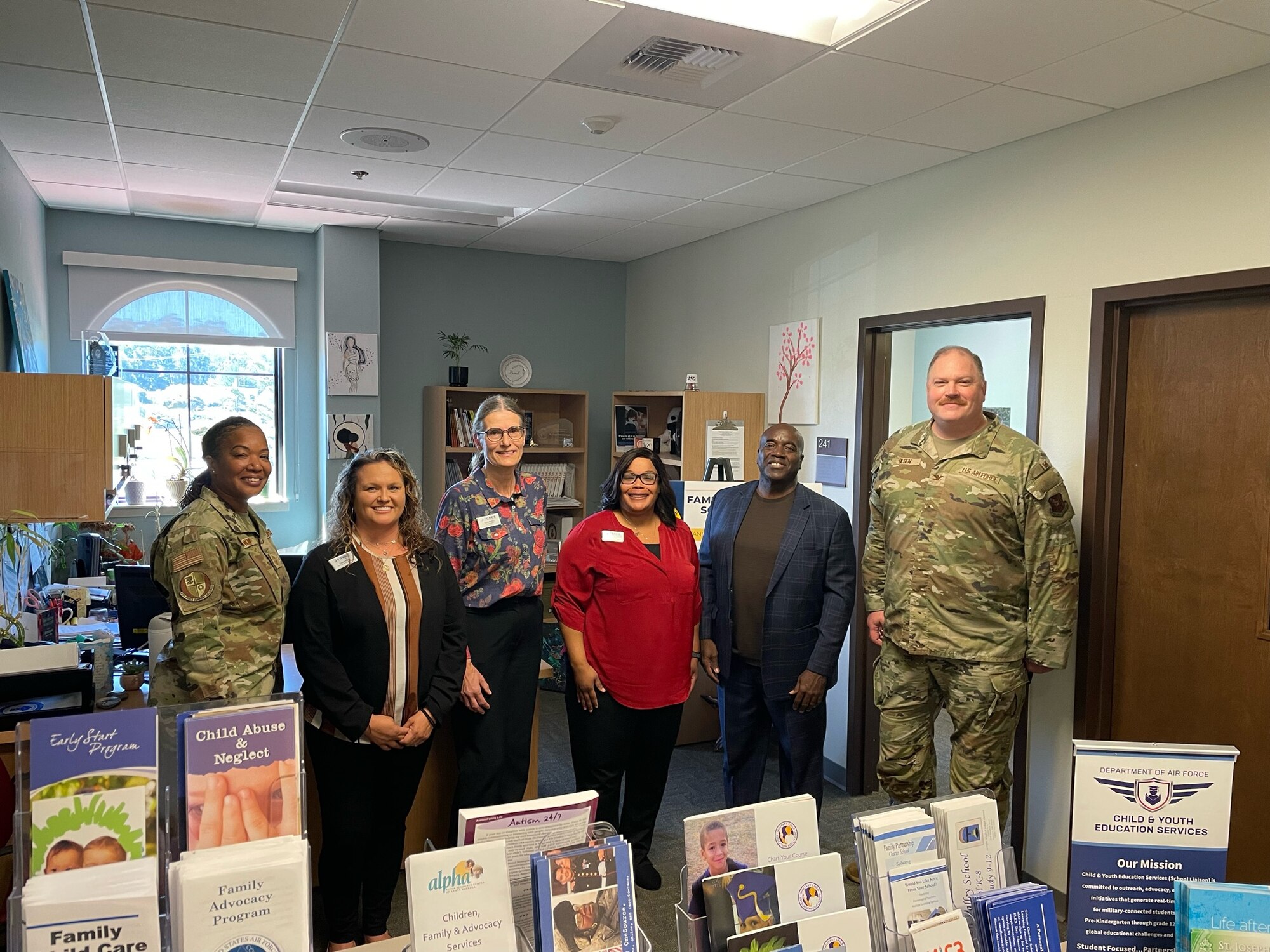 Chief Master Sgt. Tiffany Brown, Raymond Magby, and Col. Peter Olson, Maj. Gen. Eugene L. Eubank Award evaluators from Air Force Manpower, Personnel & Services pose with 30th Force Support Squadron personnel who manage Child and Youth Programs at Vandenberg Space Force Base, Calif., March 19, 2024