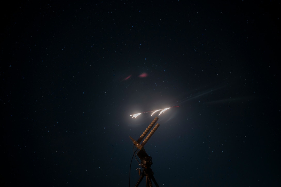 The AC-130J Ghostrider pops flares during an exercise where their GPS is jammed at Cannon Air Force Base, New Mexico on March 5, 2024.