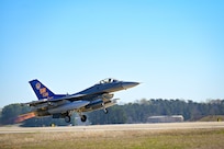 U.S. Air Force F-16 taking off from Shaw Air Force Base runway.