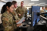 Airman reads a checklist during the exercise