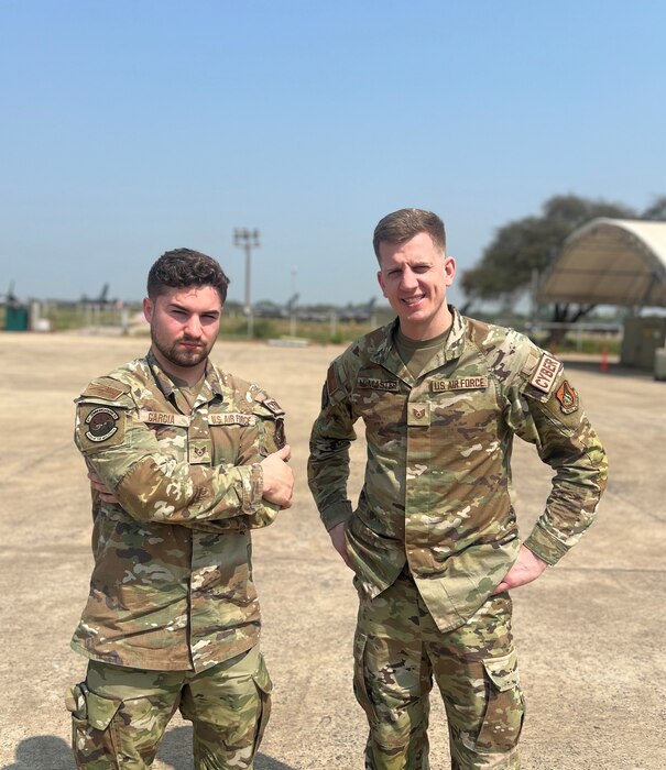 Staff Sgt. Natanael Garcia and Tech. Sgt. Joshua McMaster pose for a photo during Cope Tiger 2024.