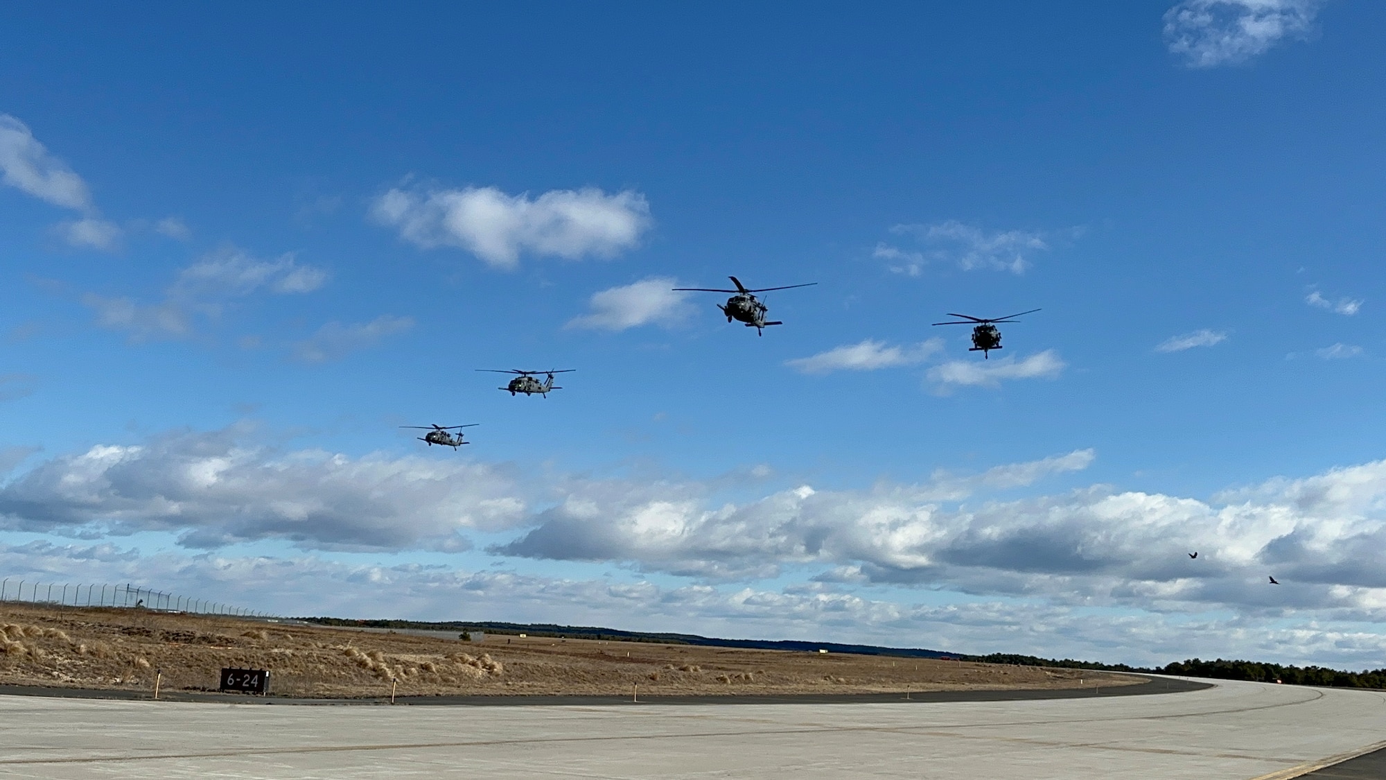 Four HH-60G Pave Hawk search and rescue helicopters assigned to the 106th Rescue Wing, New York Air National Guard, take off from F.S. Gabreski Air National Guard Base, Westhampton Beach, N.Y., on a mission during Exercise Agile Rage 2024, Feb. 29, 2024. The exercise focused on realistic scenarios to prepare Air National Guard units for combat challenges.