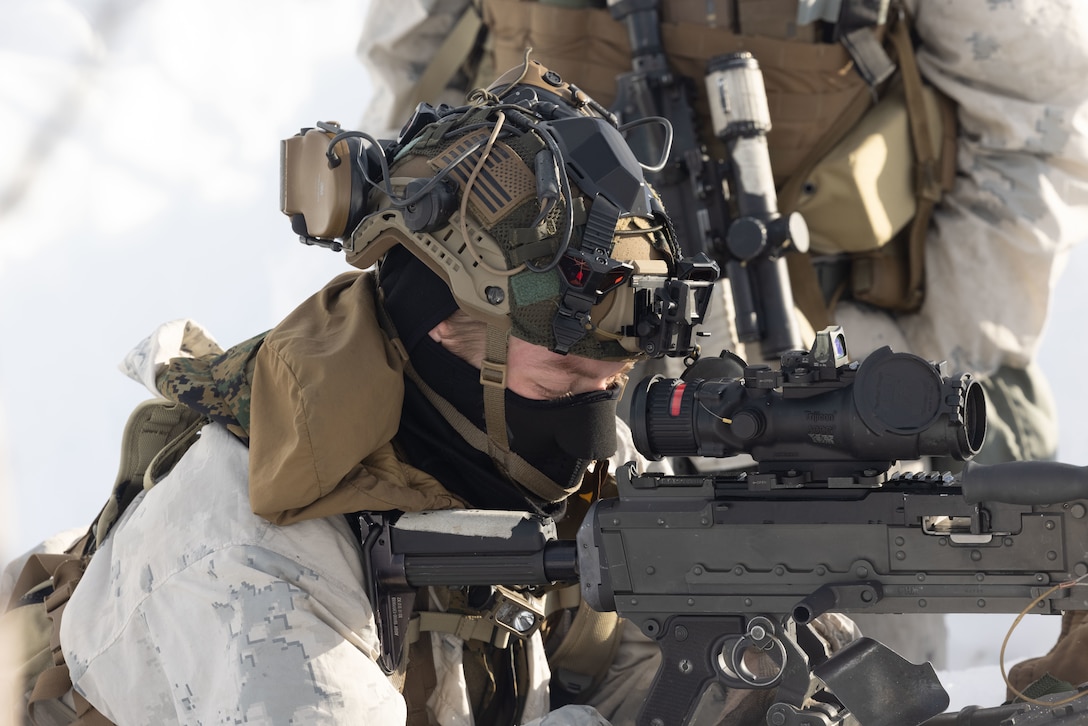 U.S. Marine Corps Lance Cpl. Jason Snipe, a native of Georgia and a rifleman with 1st Battalion, 2nd Marine Regiment, 2nd Marine Division, sets up the M240B Machine Gun during Exercise Nordic Response 24 in Alta, Norway, March 7, 2024. Exercise Nordic Response 24 is designed to enhance military capabilities and allied cooperation in high-intensity warfighting scenarios under challenging arctic conditions, while providing U.S. Marines unique opportunities to train alongside NATO Allies and partners. (U.S. Marine Corps photo by Cpl. Joshua Kumakaw)
