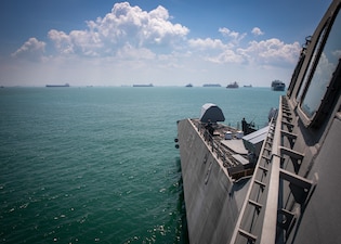 USS Mobile (LCS 26) departs Changi Harbor in Singapore.