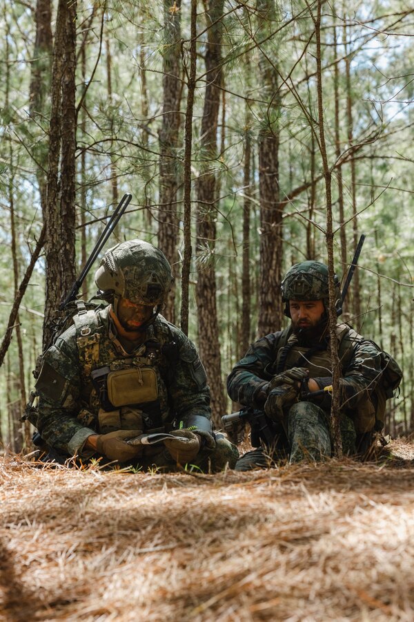 Dutch Marines with Marine Squadron Carib, Netherlands Marine Corps prepare to engage simulated enemies during Exercise Caribbean Urban Warrior on Camp Lejeune, North Carolina, March 21, 2024. Exercise Caribbean Urban Warrior is a bilateral training evolution designed to increase global interoperability between 2d Marine Division and Marine Squadron Carib. (U.S. Marine Corps photo by Lance Cpl. Emma Gray)