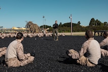 U.S. Marine Corps Sgt. Joshua Mitrano, a martial arts instructor with Support Training Battalion, gives instruction to recruits with Fox Company, 2nd Recruit Training Battalion, about Marine Corps Martial Arts Program techniques during a training event at Marine Corps Recruit Depot San Diego, California, March 18, 2024. MCMAP aims to strengthen the mental and moral resiliency of individual recruits and Marines through realistic combative training, warrior ethos studies, and physical hardening. (U.S. Marine Corps photo by Cpl. Alexander O. Devereux)