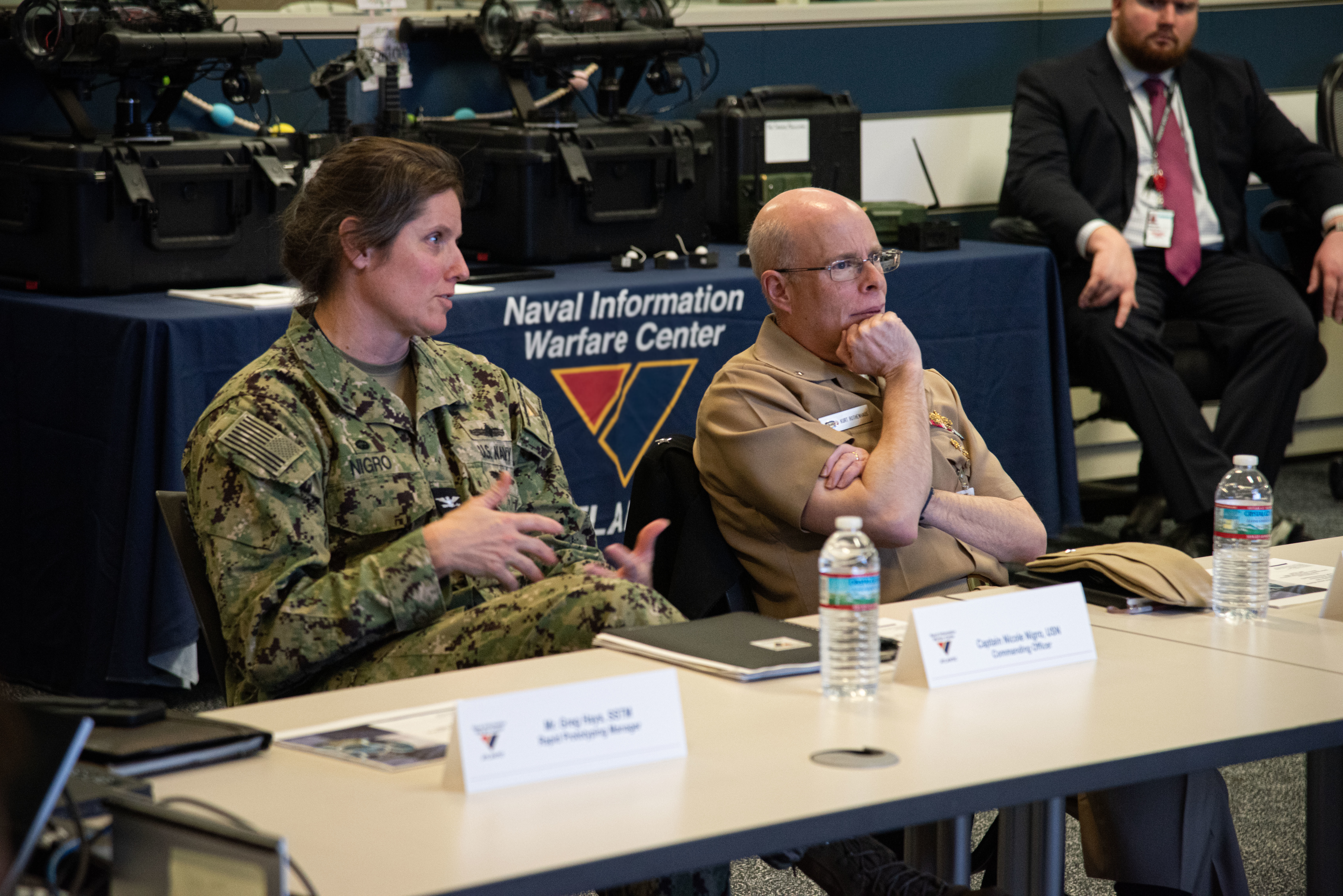 Chief of Naval Research Rear Adm. Kurt Rothenhaus receives briefings at Naval Information Warfare Center Atlantic on March 21 from members of the Expeditionary Warfare Department and the Science and Technology Department during the command’s annual System of Systems Naval Integration Experiment.