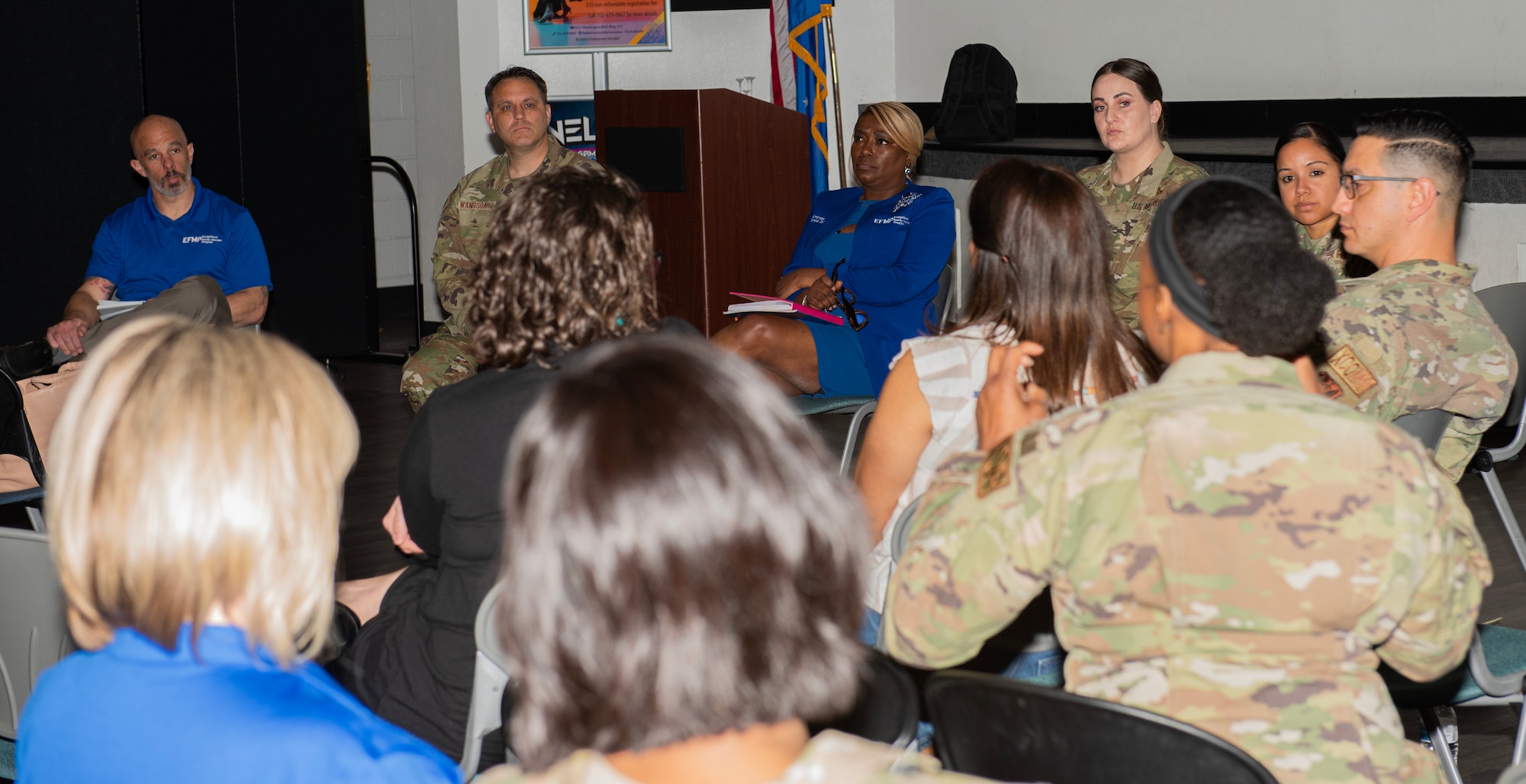 Members from the Exceptional Family Member Program (EFMP) Central Cell answer questions during a visit to Nellis Air Force Base, Nevada, March 4-8, 2024.