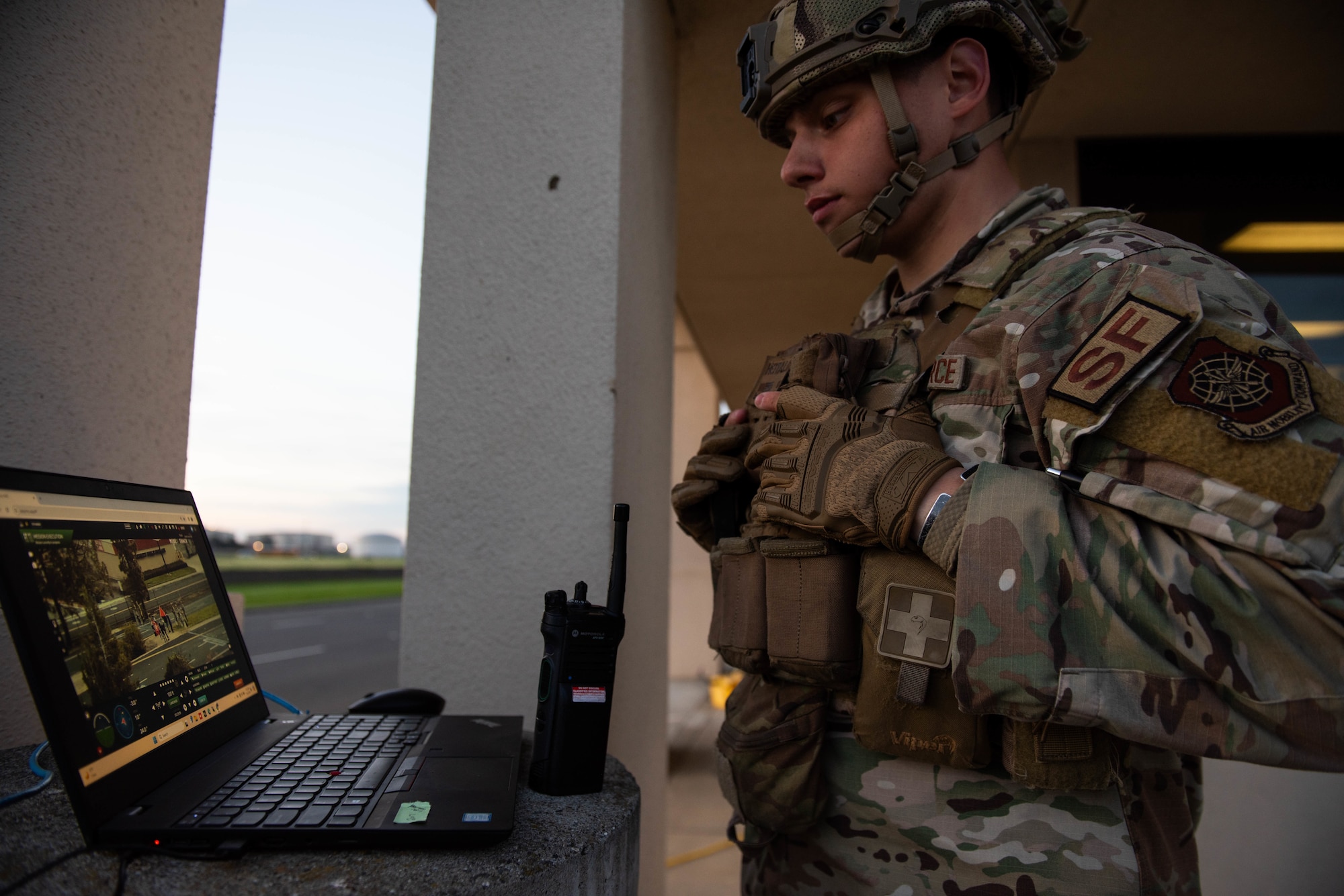 Airmen watches video feed.