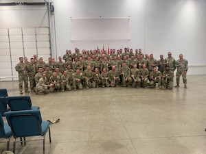 Missouri National Guard Airmen and Soldiers pose for a group photo during the 2024 adjutant general's annual TAG Match marksmanship competition at Camp Crowder, Neosho, Missouri. Nine Airmen from the 139th Airlift Wing earned the Schützenschnur, or German Armed Forces Marksmanship Badge.