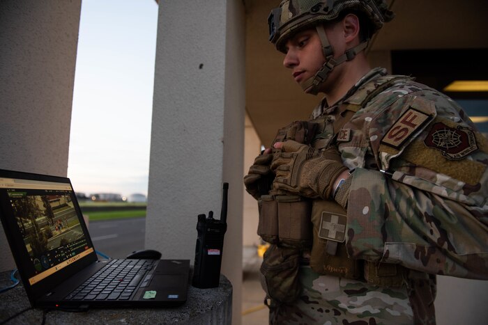 Airmen watches video feed.