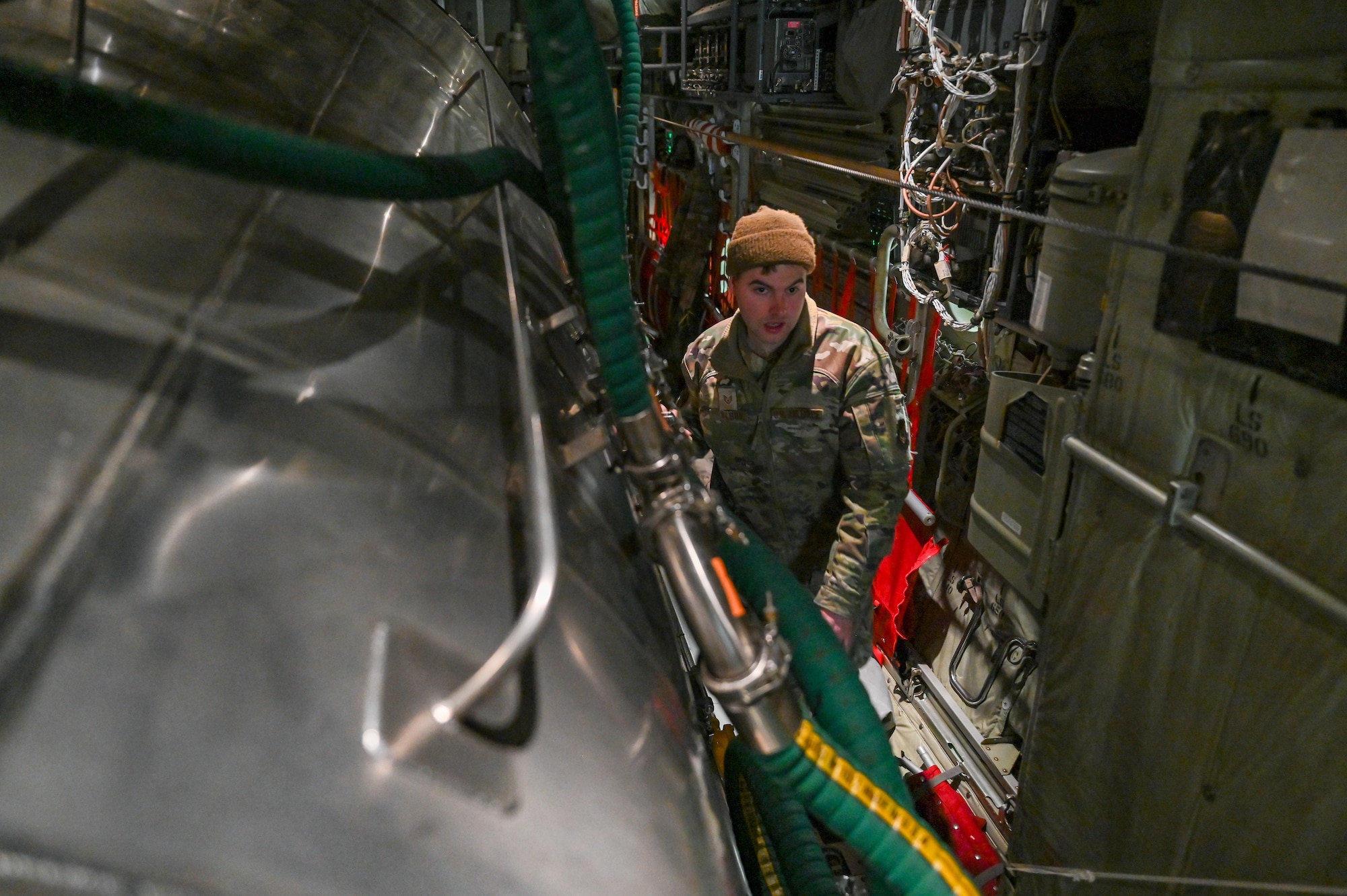 Staff Sgt. Zachery Wilson, an aerial spray system maintainer assigned to the 910th Maintenance Squadron, spot checks the 910th Airlift Wing’s electronic modular aerial spray system on board a C-130J-30 Super Hercules aircraft from Keesler Air Force Base, Mississippi, visiting Youngstown Air Reserve Station, Ohio, March 21, 2024.