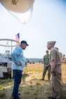 Chief of Naval Research Rear Adm. Kurt Rothenhaus receives briefings at Naval Information Warfare Center Atlantic on March 21 from members of the Expeditionary Warfare Department and the Science and Technology Department during the command’s annual System of Systems Naval Integration Experiment.