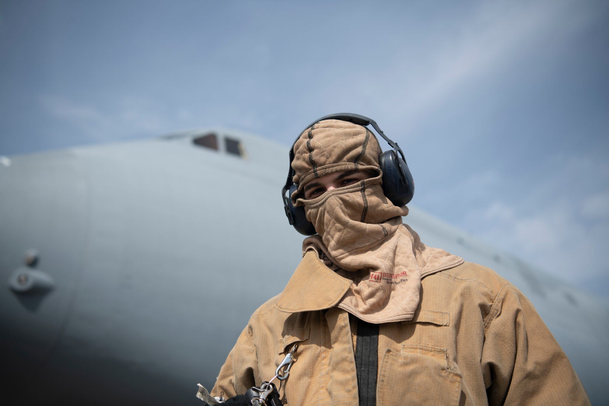 A firefighter poses for a photo during egress training