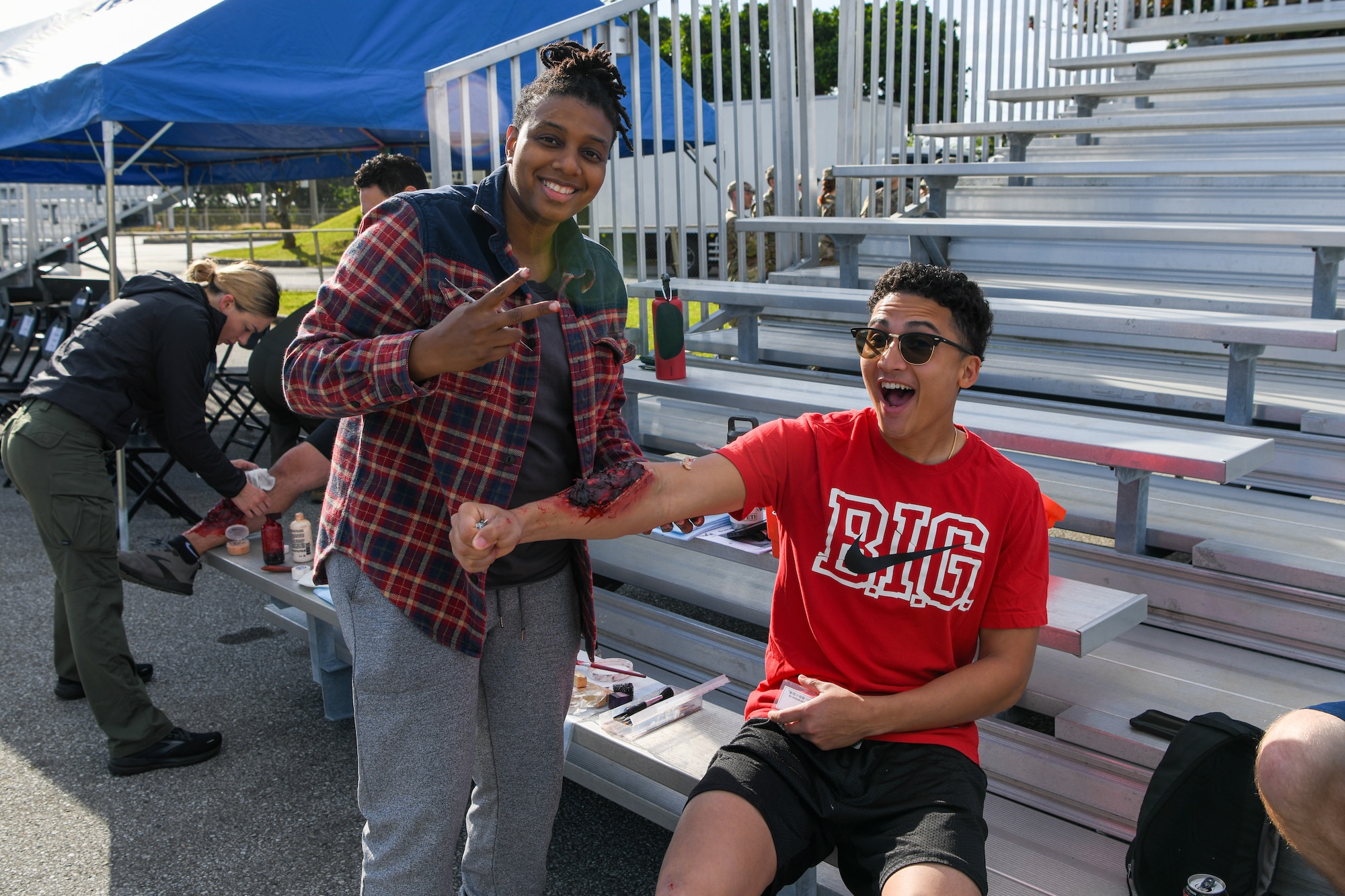 U.S. Air Force Staff Sgt. Ashlee Johnson, left, 18th Dental Squadron dental assistant, and U.S. Air Force Senior Airman Nathaniel Rodriguez, 18th Civil Engineer Squadron pavement and heavy equipments operations, pose for a photo showcasing moulage.