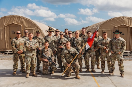 U.S. Soldiers with the 56th Stryker Brigade Combat Team, 28th Infantry Division, deployed as Task Force Paxton, receive their combat patches during a ceremony at Camp Simba, Kenya, March 21, 2024.