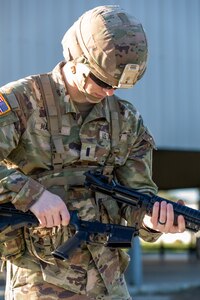 Army Reserve Soldiers conduct weapons qualification for Best Warrior