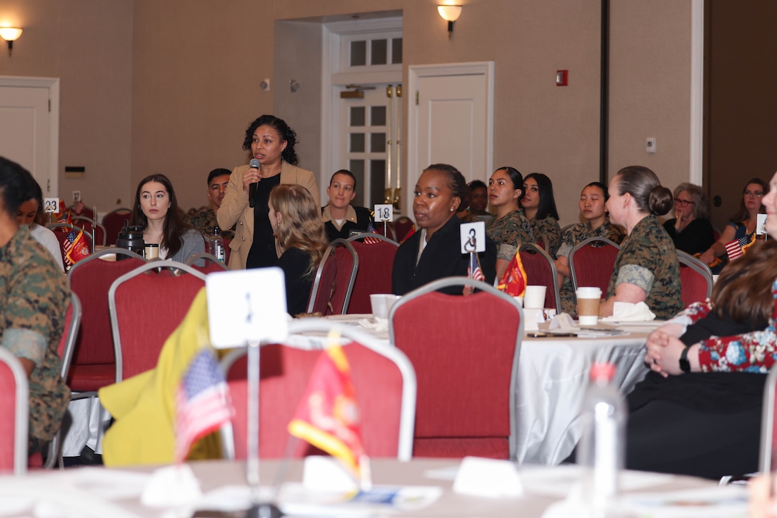 An audience member asks a question during the Women’s Health Symposium 2024 at The Clubs at Quantico on Marine Corps Base Quantico, Virginia, March 18, 2024. The symposium covered a range of topics, concerning women’s health with the intent to educate and generate awareness to uniformed and civilian personnel. (U.S. Marine Corps photo by Lance Cpl. David Brand