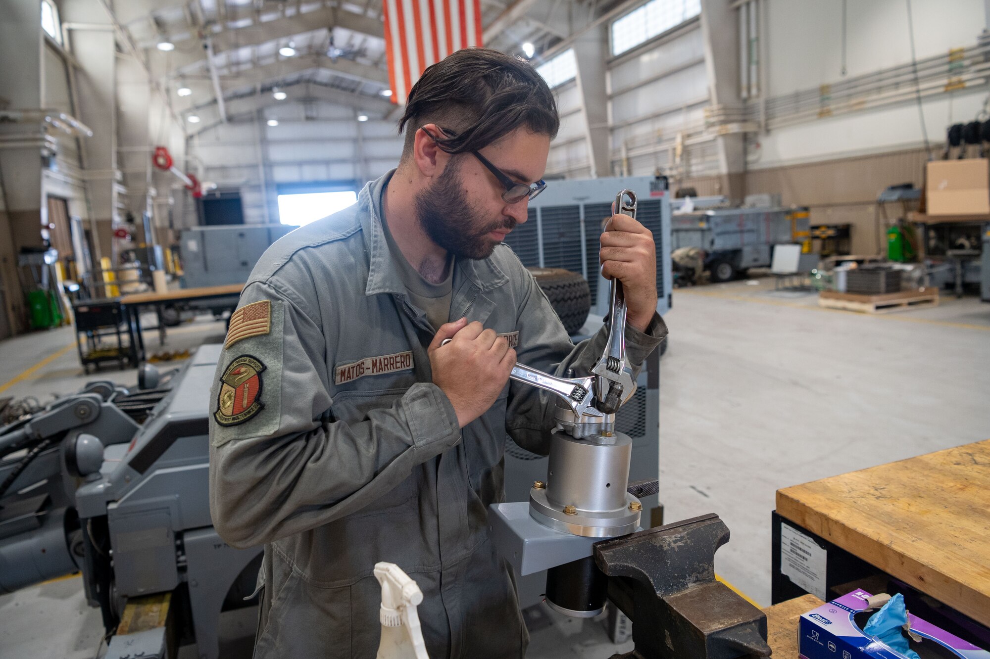 U.S. Air Force Senior Airman Gilberto Matos-Marrero, 20th Equipment Maintenance Squadron aerospace ground equipment technician, tightens a boost pump at Shaw Air Force Base, S.C., March 12, 2024. Matos-Marrero’s deep understanding of the foundational concepts required by his specialty allows him to detect and resolve electrical, mechanical and technical problems before further maintenance is required. (U.S. Air Force photo by Airman 1st Class Kyrii Richardson)