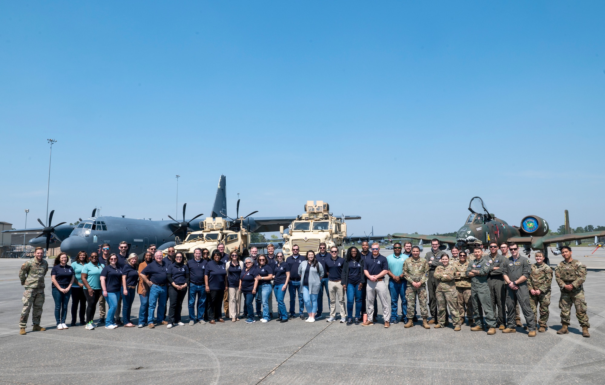 The Leadership Lowndes class of 2024 and U.S. Air Force Airmen assigned to various units take a group photo at Moody Air Force Base, Georgia, March 21, 2024. Local leaders were able to interact with various weapon systems and speak with the Airmen to learn about their missions and capabilities. (U.S. Air Force photo by Airman 1st Class Leonid Soubbotine)