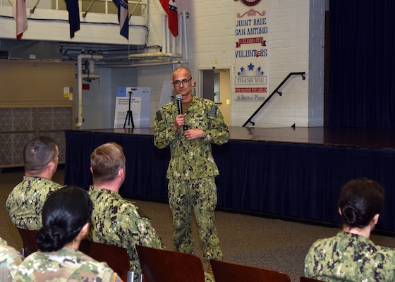 JOINT BASE SAN ANTONIO-FORT SAM HOUSTON – (March 25, 2024) – Rear Adm. Guido Valdes, commander, Naval Medical Forces Pacific (NMFP), held a townhall meeting at the Military and Family Readiness Center during his official visit to Naval Medical Research Unit (NAMRU) San Antonio. Valdes, who serves as the Chief of Navy Medical Corps, has oversight of 10 Navy Medicine Readiness and Training Commands on the West Coast and Pacific Rim as well as Navy Medicine's eight global research labs. Valdes also serves under the Defense Health Agency (DHA) as the director of the Defense Health Network Pacific Rim where he oversees the delivery and integration of healthcare at nine medical treatment facilities (MTF) on the West Coast and Pacific Rim. NAMRU San Antonio’s mission is to conduct gap driven combat casualty care, craniofacial, and directed energy research to improve survival, operational readiness, and safety of Department of Defense (DoD) personnel engaged in routine and expeditionary operations. It is one of the leading research and development laboratories for the U.S. Navy under the DoD and is one of eight subordinate research commands in the global network of laboratories operating under the Naval Medical Research Command in Silver Spring, Md. (U.S. Navy photo by Burrell Parmer, NAMRU San Antonio Public Affairs/Released)