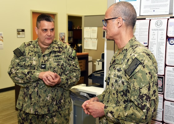 JOINT BASE SAN ANTONIO-FORT SAM HOUSTON – (March 25, 2024) – Capt. Ewell Hollis, (Medical Corps), executive officer, Naval Medical Research Unit (NAMRU) San Antonio, speaks with Rear Adm. Guido Valdes, commander, Naval Medical Forces Pacific (NMFP), during Valdes’ official visit at the Tri-Service Research Laboratory. Valdes, who serves as the Chief of Navy Medical Corps, has oversight of 10 Navy Medicine Readiness and Training Commands on the West Coast and Pacific Rim as well as Navy Medicine's eight global research labs. Valdes also serves under the Defense Health Agency (DHA) as the director of the Defense Health Network Pacific Rim where he oversees the delivery and integration of healthcare at nine medical treatment facilities (MTF) on the West Coast and Pacific Rim. NAMRU San Antonio’s mission is to conduct gap driven combat casualty care, craniofacial, and directed energy research to improve survival, operational readiness, and safety of Department of Defense (DoD) personnel engaged in routine and expeditionary operations. It is one of the leading research and development laboratories for the U.S. Navy under the DoD and is one of eight subordinate research commands in the global network of laboratories operating under the Naval Medical Research Command in Silver Spring, Md. (U.S. Navy photo by Burrell Parmer, NAMRU San Antonio Public Affairs/Released)