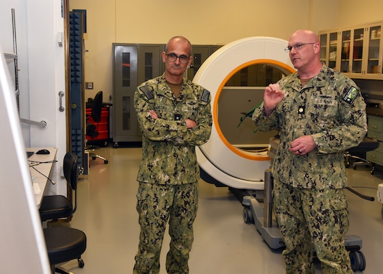 JOINT BASE SAN ANTONIO-FORT SAM HOUSTON – (March 25, 2024) – Lt. Cmdr. Jason Cole, deputy director of Naval Medical Research Unit (NAMRU) San Antonio’s Directed Energy Health Effects Directorate, speaks with Rear Adm. Guido Valdes, commander, Naval Medical Forces Pacific (NMFP) at the Tri-Service Research Laboratory. Valdes toured the facility and received a series of briefings ranging from Expeditionary and Trauma Medicine to Cellular and Immune Based Adjuncts. Valdes, who serves as the Chief of Navy Medical Corps, has oversight of 10 Navy Medicine Readiness and Training Commands on the West Coast and Pacific Rim as well as Navy Medicine's eight global research labs. Valdes also serves under the Defense Health Agency (DHA) as the director of the Defense Health Network Pacific Rim where he oversees the delivery and integration of healthcare at nine medical treatment facilities (MTF) on the West Coast and Pacific Rim. NAMRU San Antonio’s mission is to conduct gap driven combat casualty care, craniofacial, and directed energy research to improve survival, operational readiness, and safety of Department of Defense (DoD) personnel engaged in routine and expeditionary operations. It is one of the leading research and development laboratories for the U.S. Navy under the DoD and is one of eight subordinate research commands in the global network of laboratories operating under the Naval Medical Research Command in Silver Spring, Md. (U.S. Navy photo by Burrell Parmer, NAMRU San Antonio Public Affairs/Released)