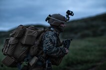 U.S. Marine Cpl. Julio Leyva a joint fires observer assigned to 1st Air Naval Gunfire Liaison Company, I Marine Expeditionary Force Information Group, I Marine Expeditionary Force, participate in a foot patrol during a brigade platoon field exercise on Marine Corps Base Camp Pendleton, California, April 7, 2020.